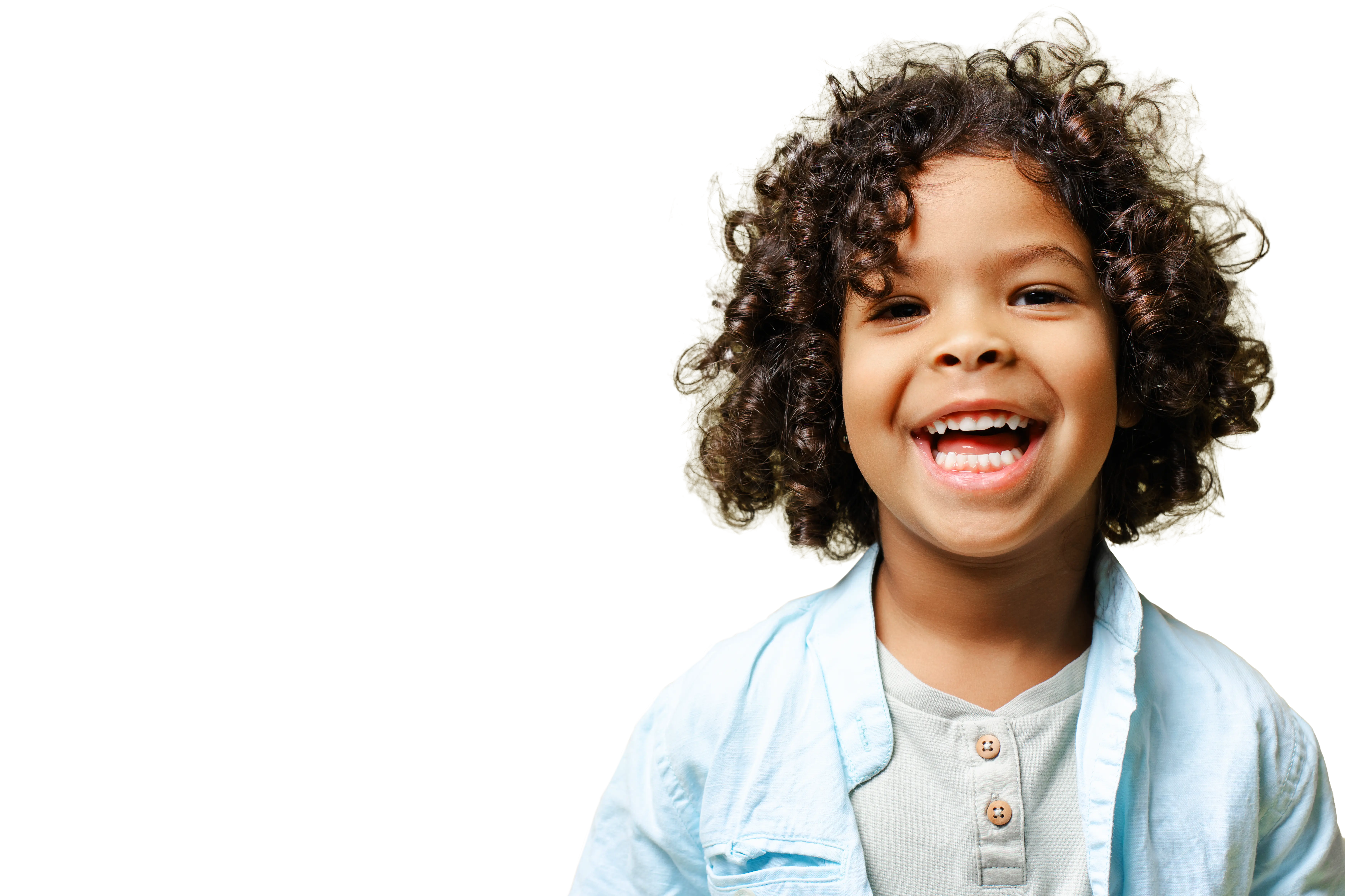 Smiling boy after braces from an orthodontist